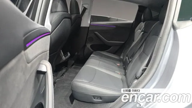 Tesla Model Y — Фото автомобиля 18