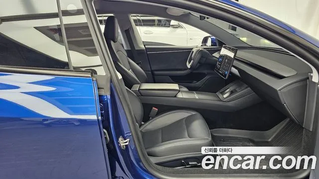 Tesla Model 3 — Фото автомобиля 11
