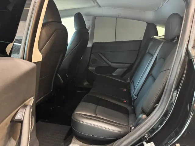 Tesla Model Y — Фото автомобиля 6