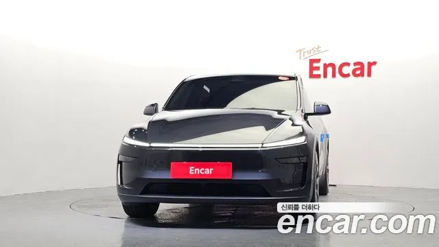 Tesla Model Y — Фото автомобиля 3