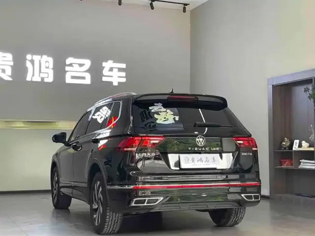 Volkswagen Tiguan L — Фото автомобиля 7