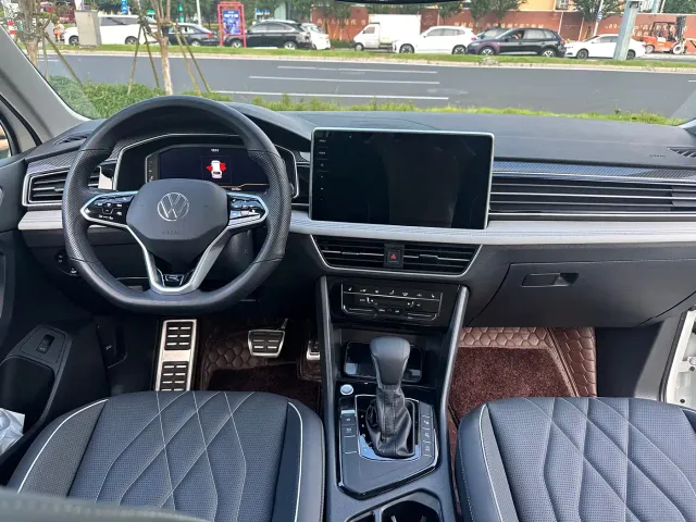 Volkswagen Tiguan L — Фото автомобиля 6