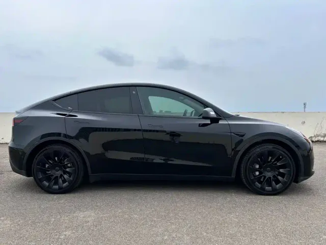 Tesla Model Y — Фото автомобиля 5