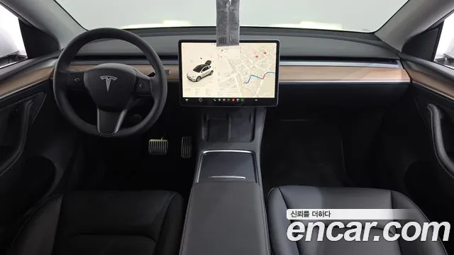 Tesla Model Y — Фото автомобиля 10