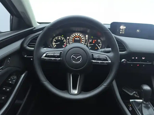 Mazda Axela — Фото автомобиля 15