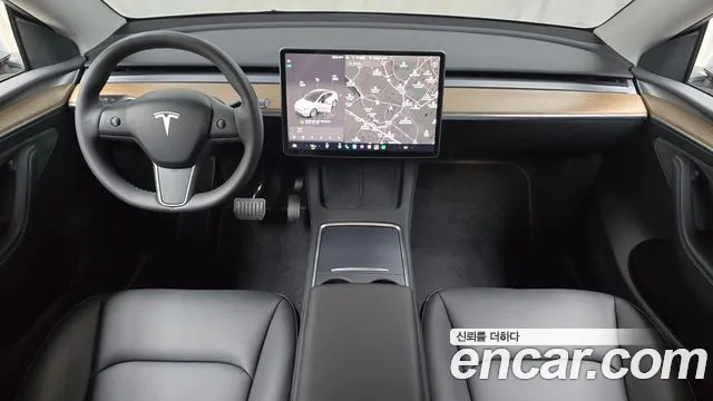 Tesla Model Y — Фото автомобиля 10