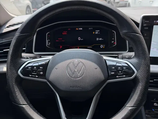 Volkswagen Tiguan L — Фото автомобиля 12
