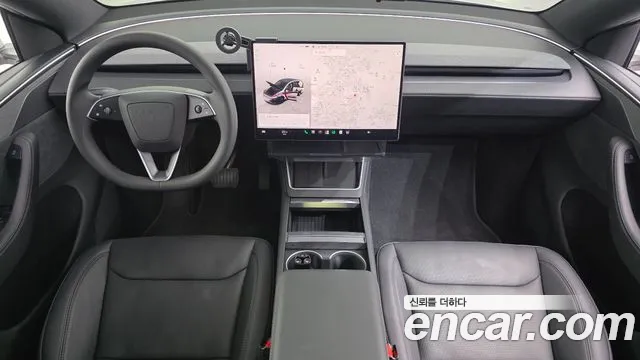 Tesla Model Y — Фото автомобиля 10