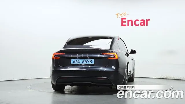 Tesla Model 3 — Фото автомобиля 4