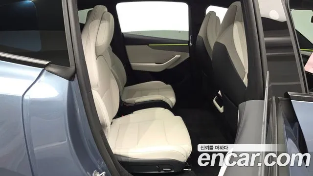 Tesla Model Y — Фото автомобиля 10