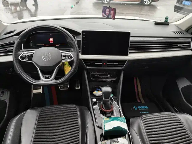 Volkswagen Tiguan L — Фото автомобиля 12