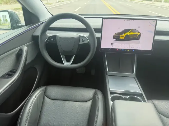 Tesla Model Y — Фото автомобиля 14