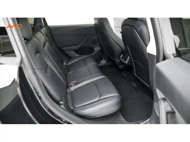 Tesla Model Y — Фото автомобиля 8