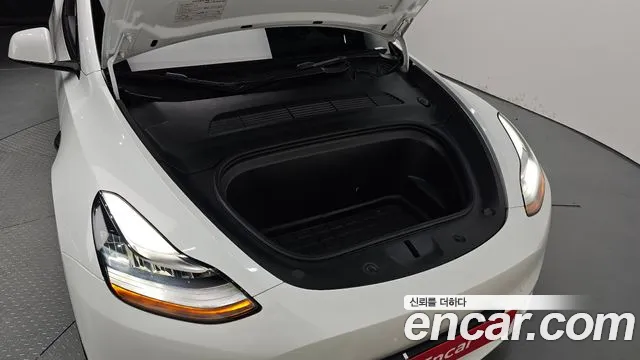 Tesla Model Y — Фото автомобиля 5
