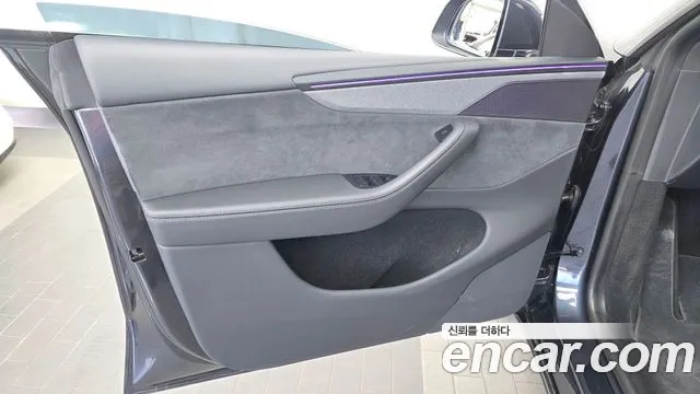 Tesla Model Y — Фото автомобиля 13