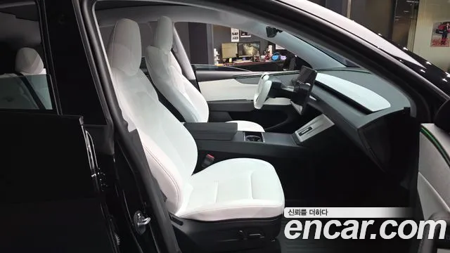 Tesla Model Y — Фото автомобиля 11