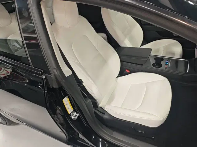 Tesla Model 3 — Фото автомобиля 24