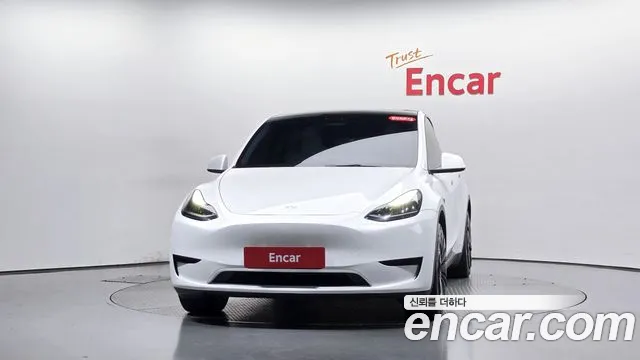 Tesla Model Y — Фото автомобиля 3