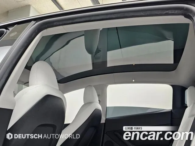 Tesla Model Y — Фото автомобиля 18