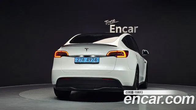 Tesla Model Y — Фото автомобиля 4