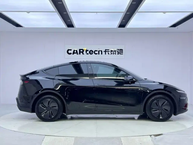Tesla Model Y — Фото автомобиля 6