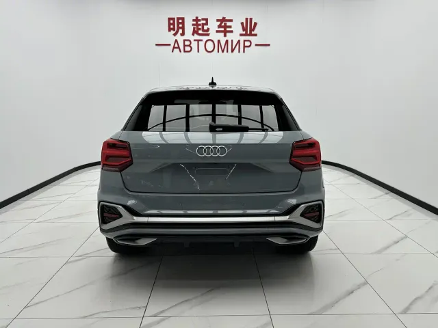 Audi Q2L — Фото автомобиля 10