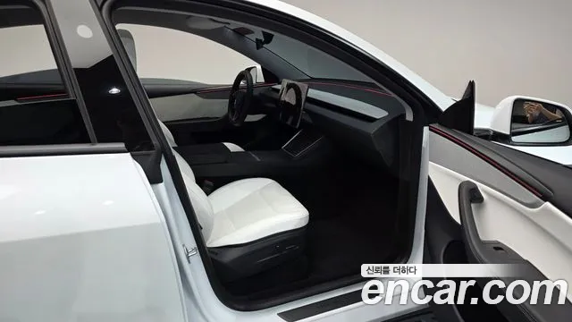 Tesla Model Y — Фото автомобиля 17