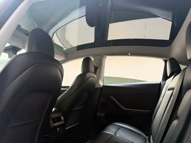 Tesla Model Y — Фото автомобиля 14