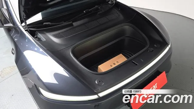 Tesla Model Y — Фото автомобиля 6