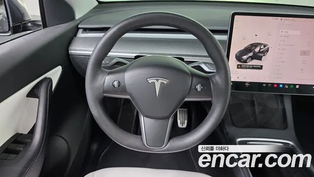 Tesla Model Y — Фото автомобиля 13
