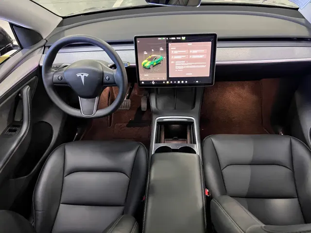 Tesla Model Y — Фото автомобиля 9