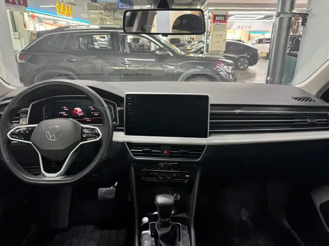Volkswagen Tiguan L — Фото автомобиля 13
