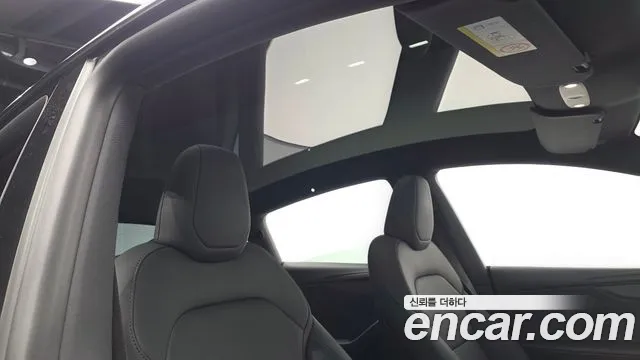 Tesla Model Y — Фото автомобиля 15