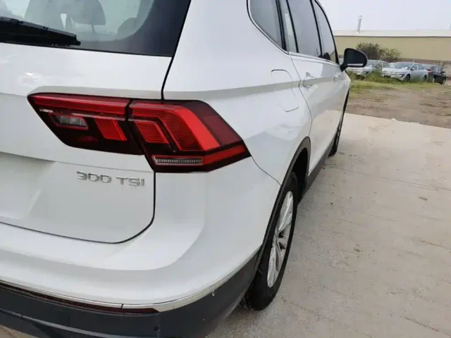 Volkswagen Tiguan L — Фото автомобиля 7