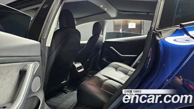 Tesla Model 3 — Фото автомобиля 16