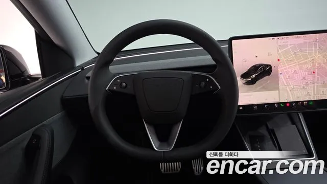 Tesla Model Y — Фото автомобиля 12
