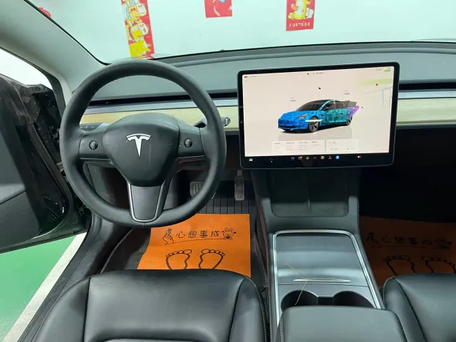 Tesla Model 3 — Фото автомобиля 11