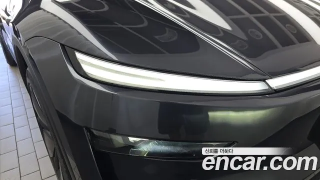Tesla Model Y — Фото автомобиля 7