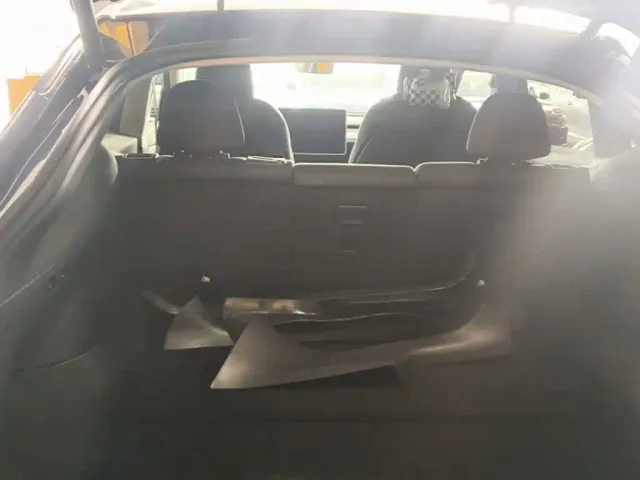 Tesla Model Y — Фото автомобиля 18