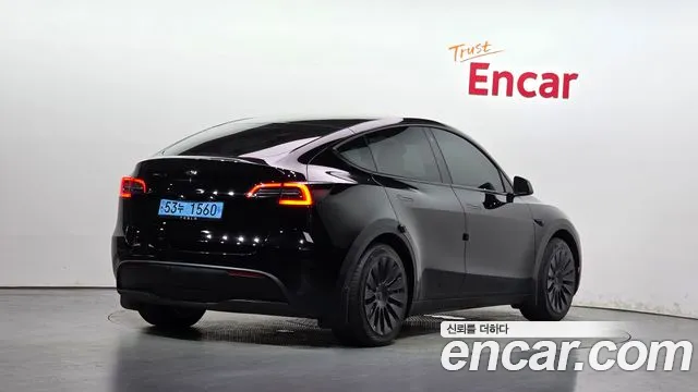 Tesla Model Y — Фото автомобиля 2