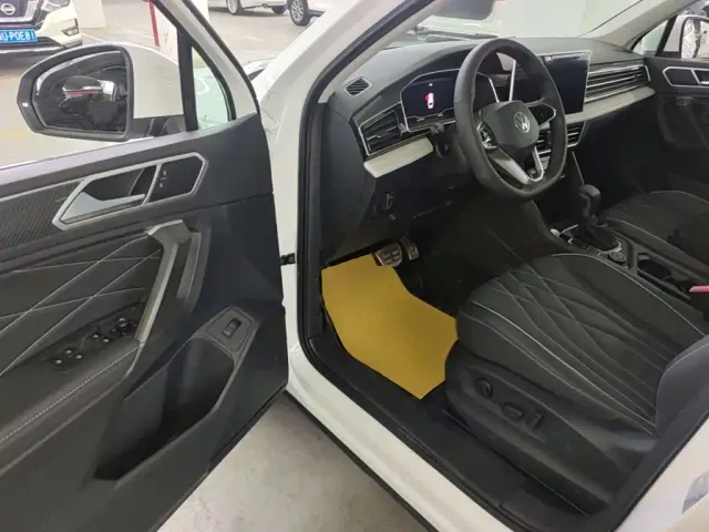 Volkswagen Tiguan L — Фото автомобиля 15