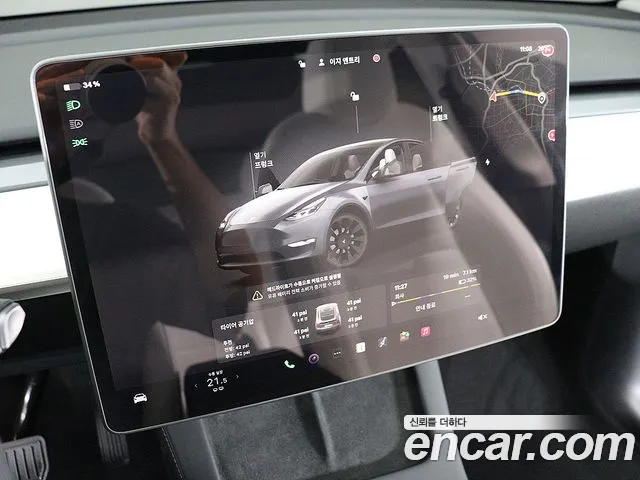 Tesla Model Y — Фото автомобиля 13