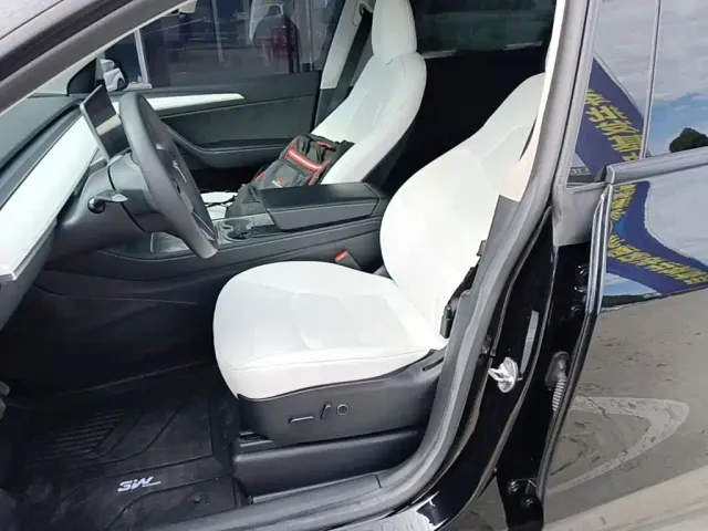 Tesla Model Y — Фото автомобиля 14