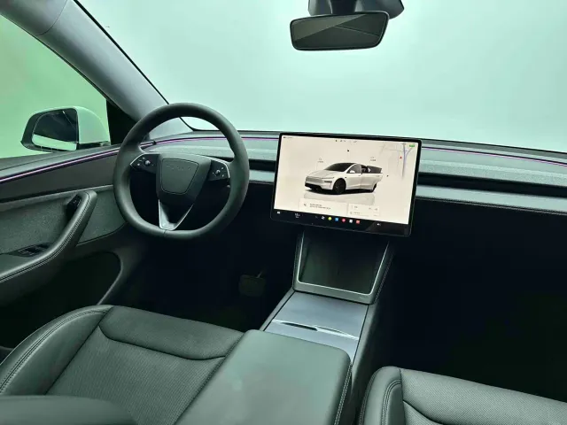 Tesla Model Y — Фото автомобиля 12
