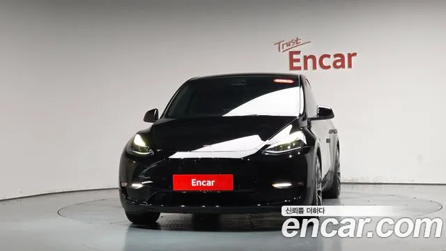 Tesla Model Y — Фото автомобиля 3