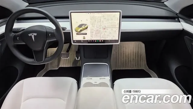 Tesla Model Y — Фото автомобиля 10