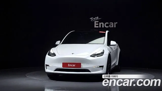 Tesla Model Y — Фото автомобиля 3