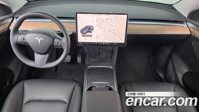 Tesla Model Y — Фото автомобиля 10