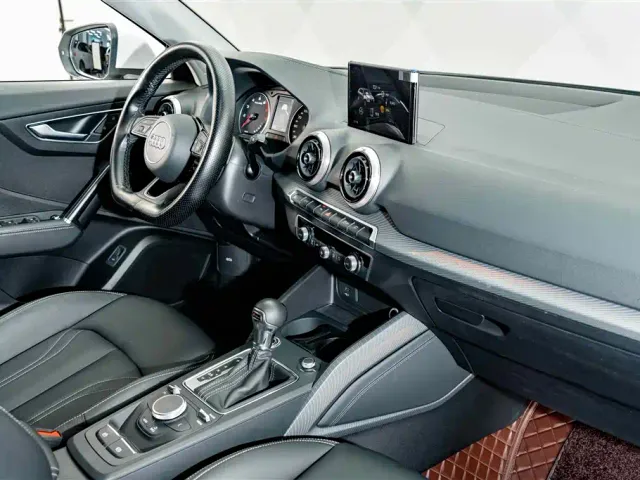 Audi Q2L — Фото автомобиля 17