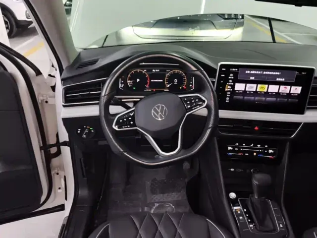 Volkswagen Tiguan L — Фото автомобиля 10